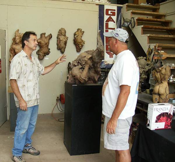 Sculptor Jeff Hall with a tour patron